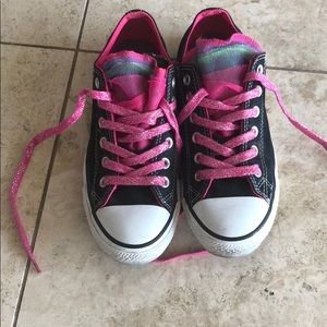 Black and rainbow converse